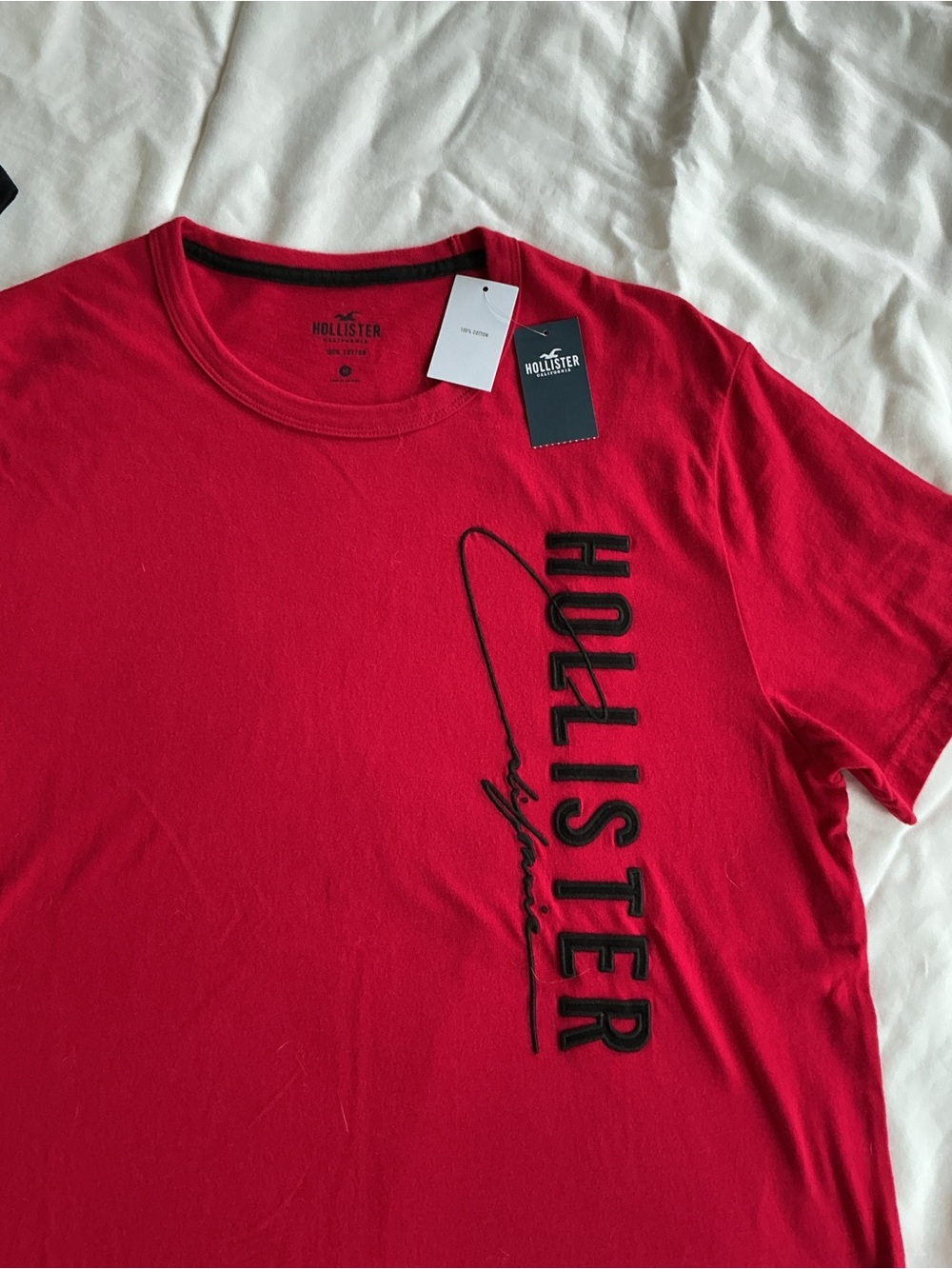 Hollister Men's Red Crew Neck Tee with Black Vertical Logo